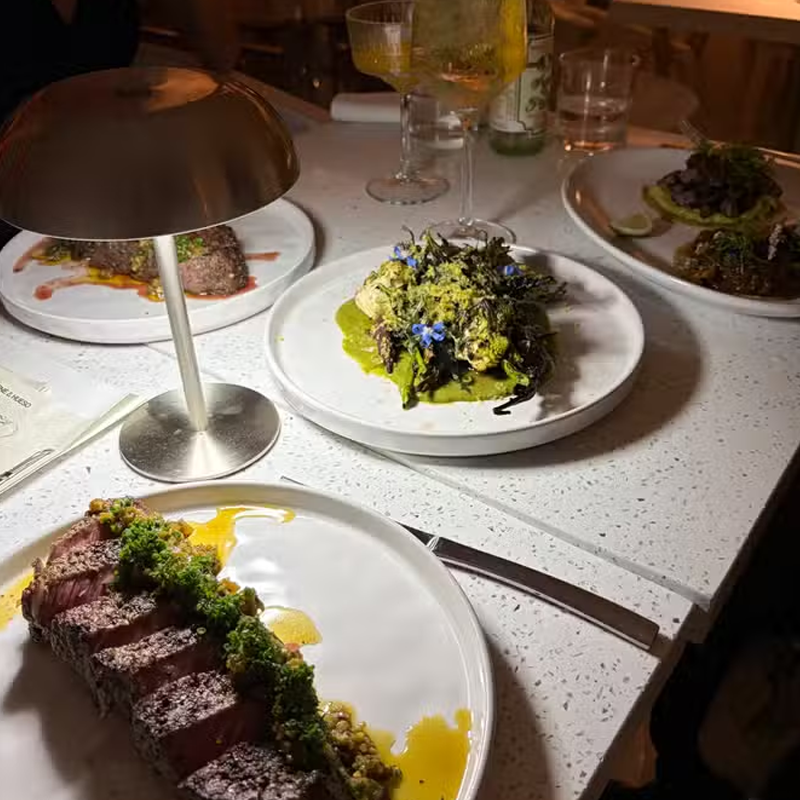 Close dining detail at Carne y Hueso