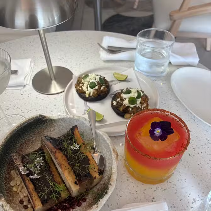 Dining room gathering at Carne y Hueso